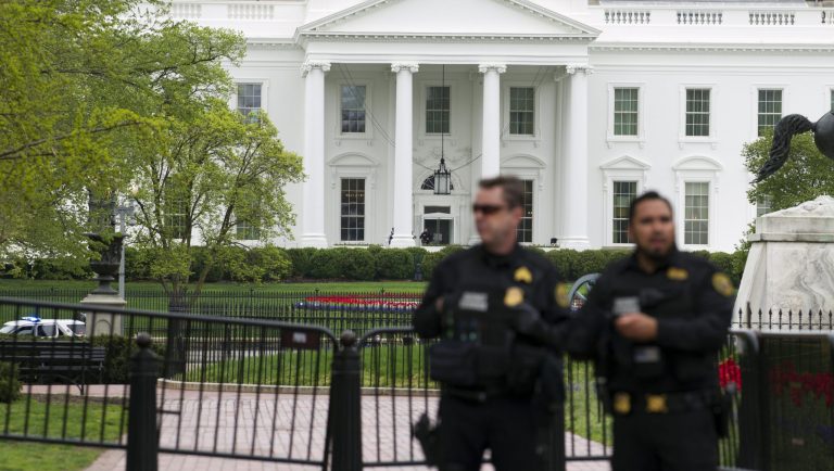 Uniformed Secret Service police officers block Lafayette Park outside the White House in Washington, Friday, April 12, 2019. The U.S. Secret Service says that a man operating a wheelchair scooter lit his outer jacket on fire while sitting along Pennsylvania Avenue outside the White House.