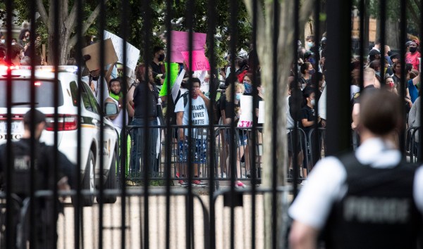 ‘The president is here’: Secret Service members in riot gear clash with protesters outside White House