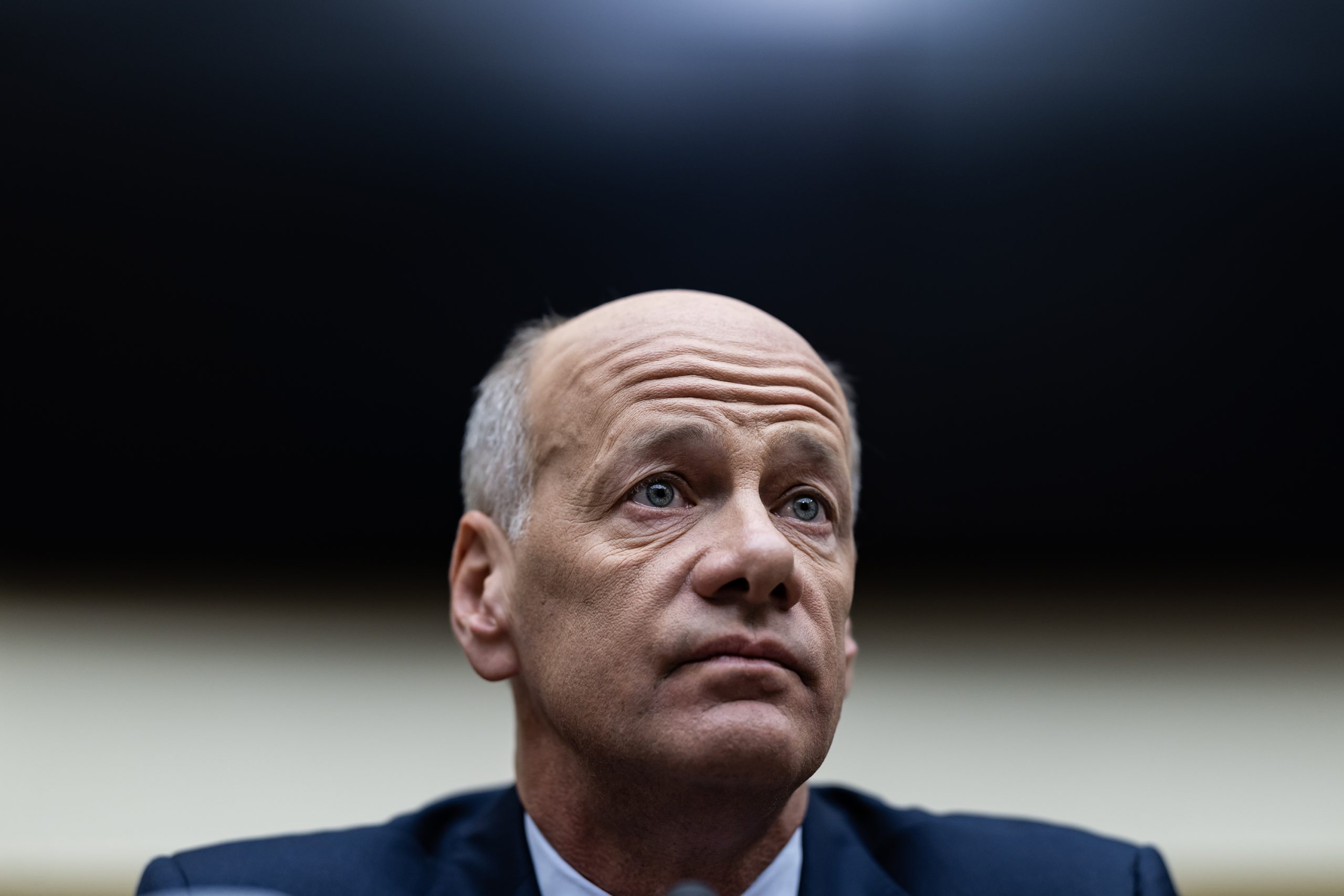 Former CEO of Silicon Valley Bank Greg Becker waits to testify at a House Financial Services Committee Hearing on Capitol Hill, on May 17, 2023, in Washington, DC. The hearing was held to examine the recent failures of Silicon Valley Bank and Signature Bank. Becker was fired from SVB after its March demise and cashed out millions in stock options.