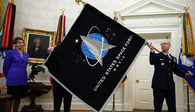 The United States Space Force flagÂ is presented in the Oval Office of the White House, Friday, May 15, 2020, in Washington.