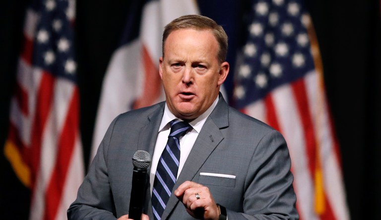 FILE - In this Nov. 8, 2017, file photo, former White House press secretary Sean Spicer speaks during the Republican Party of Iowa's annual Reagan Dinner in Des Moines, Iowa. Spicer is wading into the Massachusetts U.S. Senate race. He will be the featured speaker at a fundraiser for Republican state Rep. Geoff Diehl on April 12, 2018, at the Union Oyster House in Boston.