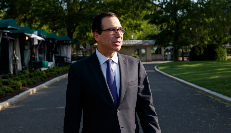 Treasury Secretary Steve Mnuchin arrives to speak with reporters about trade with China outside of the White House, Monday, May 21, 2018, in Washington.