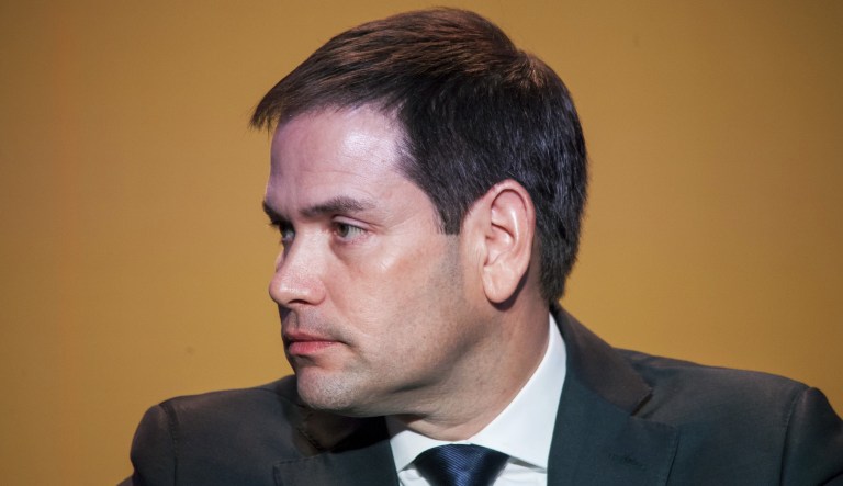 Sen. Marco Rubio, R-Fla., listens during a press conference at the CEO Summit of the Americas in Lima, Peru, on Saturday, April 14, 2018.