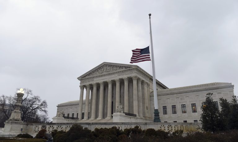 Scalia’s chair and bench draped in black following his death
