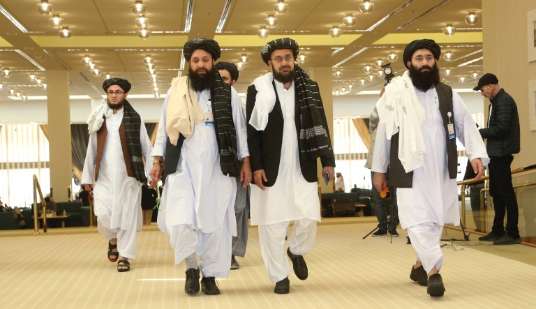 Afghanistan's Taliban delegation arrive for the agreement signing between Taliban and U.S. officials in Doha, Qatar, Saturday, Feb. 29, 2020. 