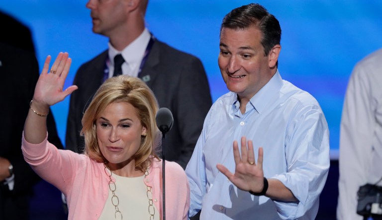 Sen. Ted Cruz, R-Tex., and wife Heidi wave from the podium during a sound check before the third day of the Republican National Convention in Cleveland, Wednesday, July 20, 2016.