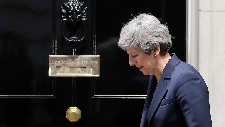 Britain's Prime Minister Theresa May awaits the arrival of Prime Minister of Nepal, KP Sharma Oli, to Downing Street in London, Tuesday, June 11, 2019. Britain's Conservative Party is holding an election to replace Prime Minister Theresa May, who resigned last week after failing to lead Britain out of the European Union on schedule. 