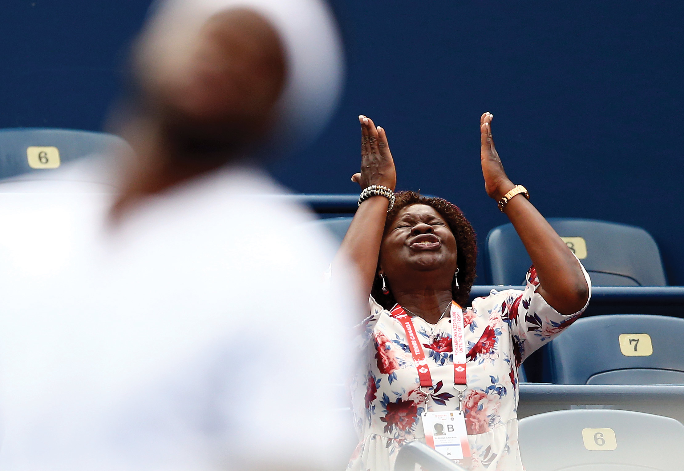 Alphina Tiafoe reacts in dismay after her son Frances Tiafoe misses a shot against Milos Raonic in the Canadian Open on August 8.