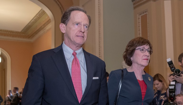 Sen. Pat Toomey, R-Pa., left, and Sen. Susan Collins, R-Maine, walk to the chamber for two votes that could end the government shutdown, at the Capitol in Washington, Thursday, Jan. 24, 2019. Both measures failed, as the partial government shutdown continues.