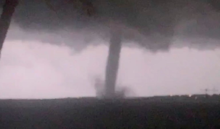 This Oct. 20, 2019 image made from video by Twitter user @AthenaRising shows the tornado in Rockwall, TX. The National Weather Service confirmed a tornado touched down in Dallas on Sunday night, causing structural damage and knocking out electricity to thousands.