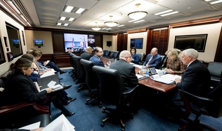 Olivia Troye (left) in the White House situation room during a coronavirus task force meeting headed by Vice President Mike Pence in March.