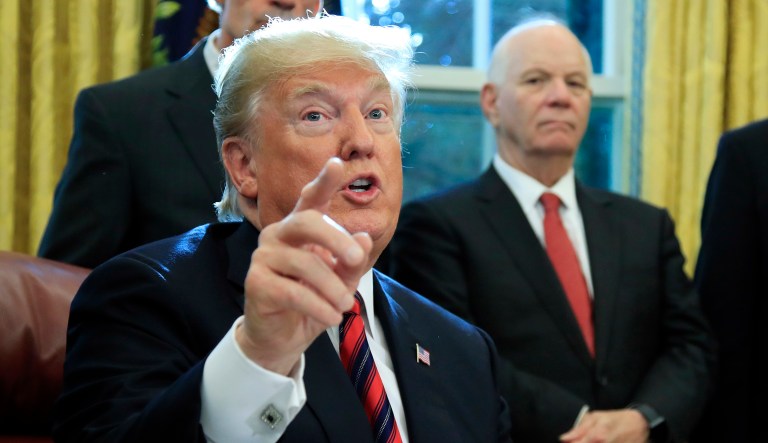 In this Oct. 23, 2018, photo, President Donald Trump speaks following a ceremony signing the "America's Water Infrastructure Act of 2018" into law in the Oval Office at the White House in Washington.