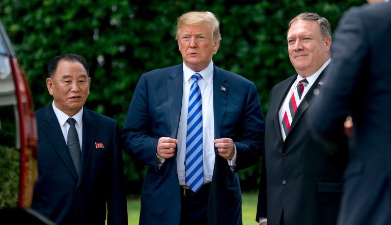President Donald Trump , Kim Yong Chol, former North Korean military intelligence chief and one of leader Kim Jong Un's closest aides, and Secretary of State Mike Pompeo stand after their meeting in the Oval Office of the White House in Washington, Friday, June 1, 2018.