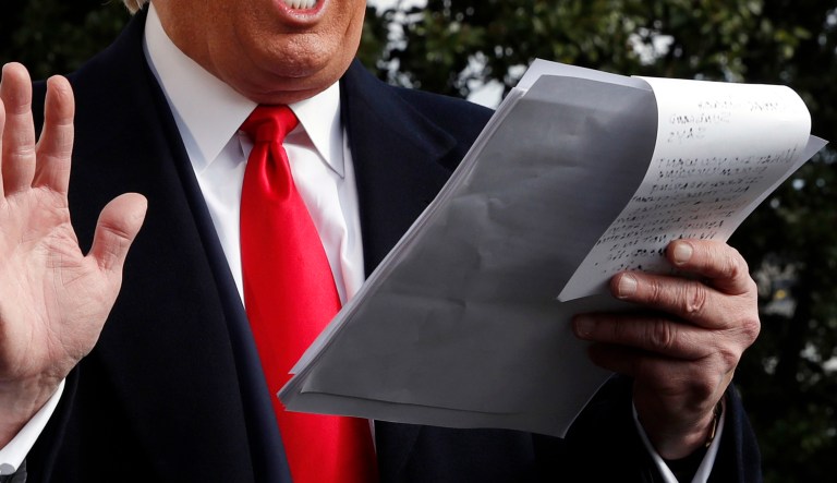 President Donald Trump talks to the media on his way to the Marine One helicopter, Wednesday, Nov. 20, 2019, as he leaves the White House in Washington, en route to Texas. 