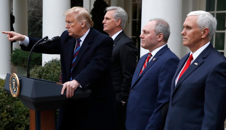 President Donald Trump calls on a reporter to ask a question as he speaks in the Rose Garden of the White House after a meeting with Congressional leaders on border security, Friday, Jan. 4, 2019, at the White House in Washington, as House Minority Leader Kevin McCarthy of Calif., House Minority Whip Steve Scalise of La., and Vice President Mike Pence listen.
