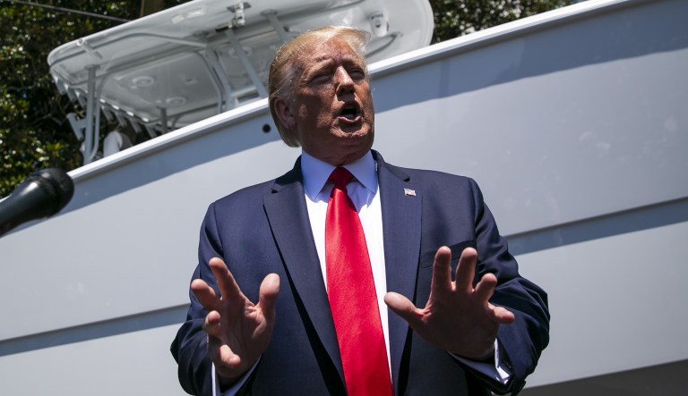 U.S. President Donald Trump speaks to members of the media during a Made in America products showcase on the South Lawn of the White House in Washington, D.C., U.S., on Monday, July 15, 2019.