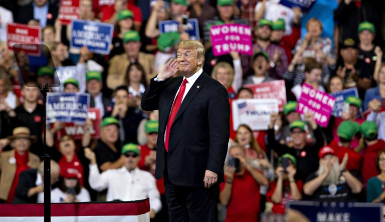 U.S. President Donald Trump gestures as he arrives to speak at a rally in Council Bluffs, Iowa, U.S., on Tuesday, Oct. 9, 2018. Trump said he is considering Goldman Sachs Group Inc.'s Dina Powell to replace his departing ambassador to the United Nations, Nikki Haley.