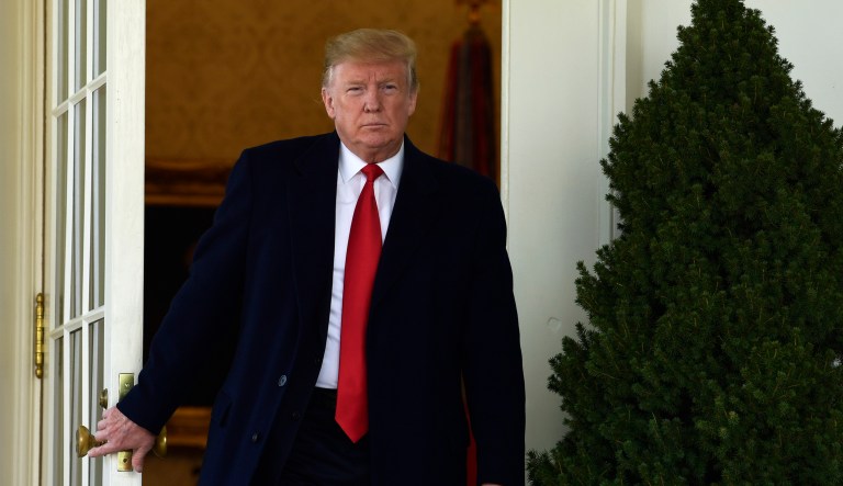 President Donald Trump walks out of the Oval Office to speak in the Rose Garden of the White House in Washington, Friday, Jan. 25, 2019, and announce a temporary deal to open the government.