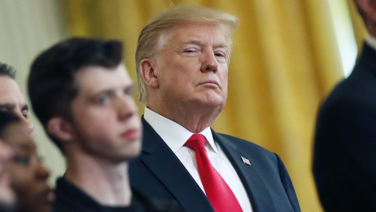 President Donald Trump stands during a Wounded Warrior Project Soldier Ride event in the East Room of the White House, Thursday, April 18, 2019, in Washington. 