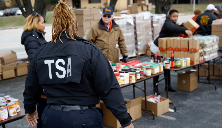 TSA employee Princess Young visits a food pantry for furloughed government workers affected by the federal shutdown, Wednesday, Jan. 23, 2019, in Baltimore.
