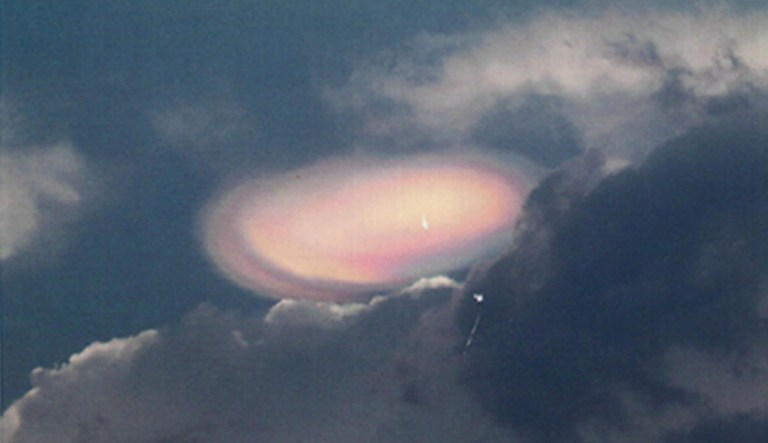 This photo issued Thursday March 3, 2011 by The National Archives in Britain of circa March 2004 shows a doughnut-shaped phenomenon  photographed by a retired RAF officer and sent to his old bosses tasked with investigating UFOs.