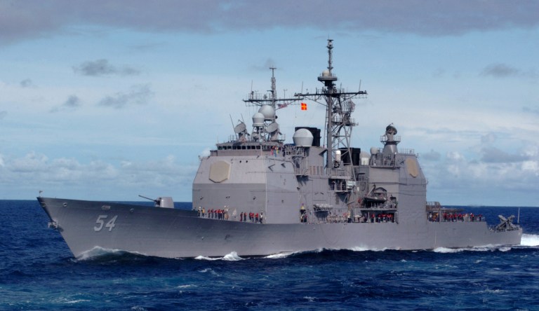 US Navy ships sail by South China Sea islands in symbolic, defiant move