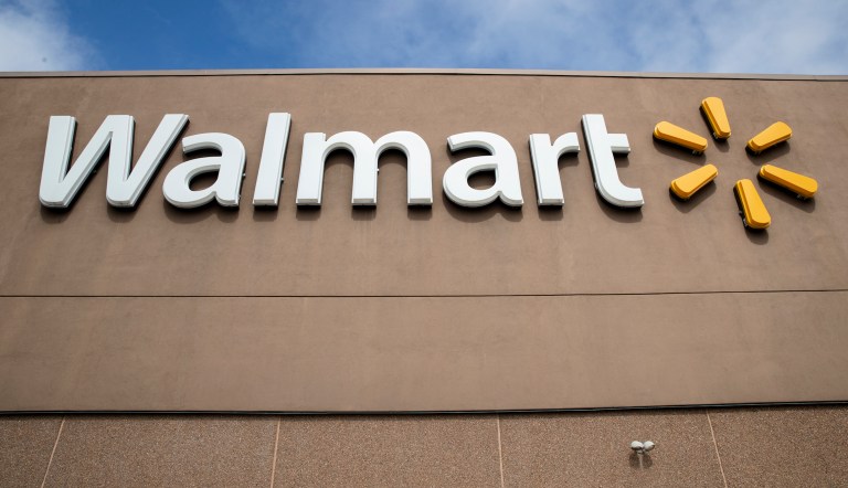 Vice President Mike Pence, center,  tours a Walmart Distribution Center  Wednesday April 1, 2020, in Gordonsville, Va. 