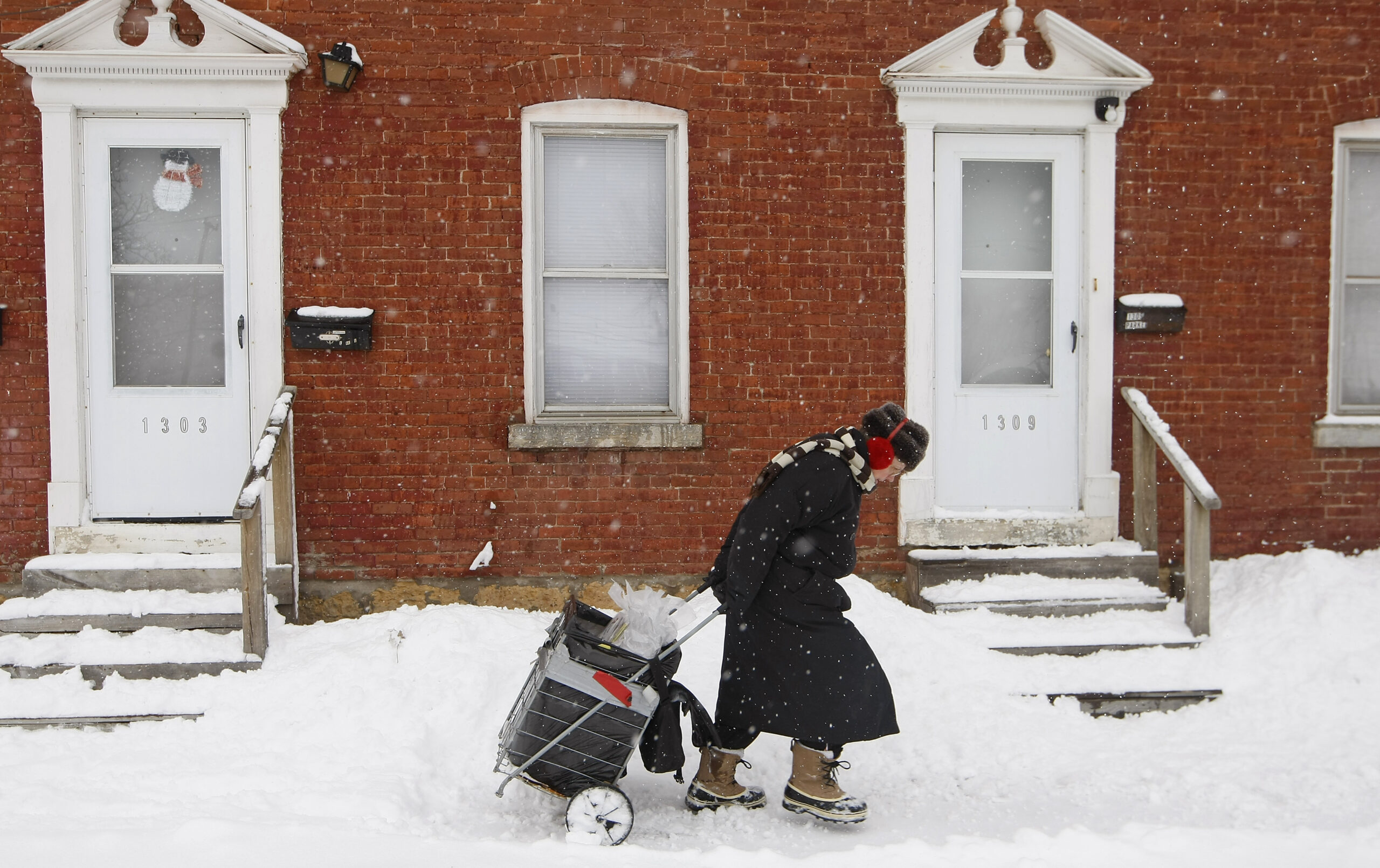 Storm brings deaths, travel problems, power losses