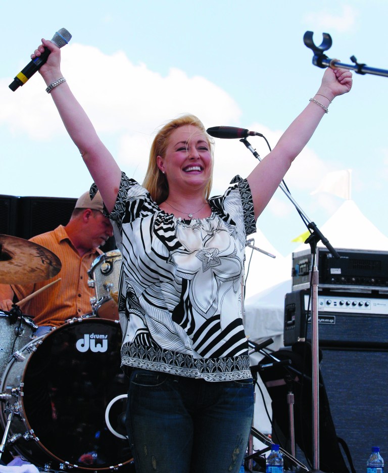 FILE - In this June 5, 2008 file photo, country music artist Mindy McCready performs at the CMA Music Festival in Nashville, Tenn. McCready, who hit the top of the country charts before personal problems sidetracked her career, died Sunday, Feb. 17, 2013. She was 37. (AP Photo/Bill Waugh, File)