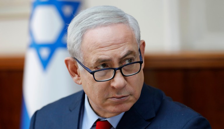 On Tuesday, three top Israeli police officers recommended that Israeli Prime Minister Benjamin Netanyahu be charged with accepting bribes and engaging in fraud. (Abir Sultan/Pool via AP)