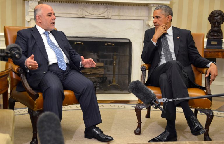 President Obama shakes hands with Iraqi Prime Minister Haider al-Abadi after a bilateral meeting in the Oval Office. (Photo by Mike Theiler -Pool/Getty Images)