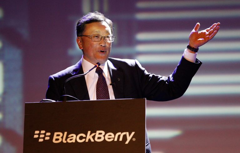 FILE - In this May 13, 2014 file photo, BlackBerry CEO John Chen delivers a speech at the launch of the new Blackberry Z3 smartphone in Jakarta, Indonesia. Blackberry surprised Wall Street Thursday, June 19, 2014, by posting results that beat analyst's expectations. Shares rose 10 percent in premarket trading as Chen cut expenses quicker than expected. (AP Photo/Achmad Ibrahim, File)