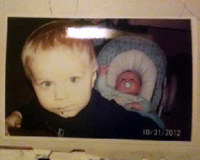 CORRECTS AGES AND LAST NAMES OF THE BOYS - This photo released by the Connecticut State Police during an Amber Alert Tuesday, Feb. 26, 2013, shows Alton Perry, 2, left, and Ashton Perry, 6 months old, right, who were taken from their daycare by their grandmother Tuesday afternoon. State police said the bodies of Ashton and Alton Perry and their grandmother, Debra Denison, 47, were found Tuesday night in Preston, Conn. Connecticut state police are calling the shooting deaths a double murder-suicide and say she had permission to pick them up from their daycare. (AP Photo/Connecticut State Police)