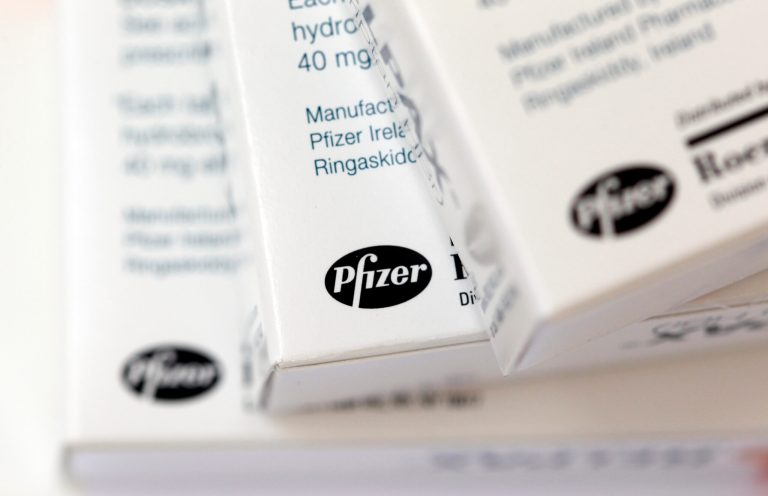 FILE - In this Jan. 30, 2012 file photo, boxes of the drug Relpax, made by Pfizer, are displayed in Surfside, Fla. Pfizer reports quarterly results before the market open on Tuesday, Jan. 28, 2014. (AP Photo/Wilfredo Lee, File)