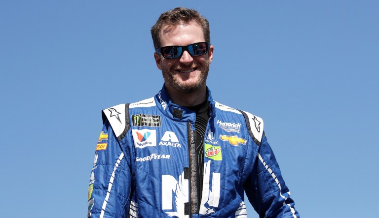 NASCAR driver Dale Earnhardt Jr. used a quote from former President John F. Kennedy to underscore his disagreement with President Trump's comments over NFL players kneeling during the national anthem. (AP Photo/Charles Krupa)