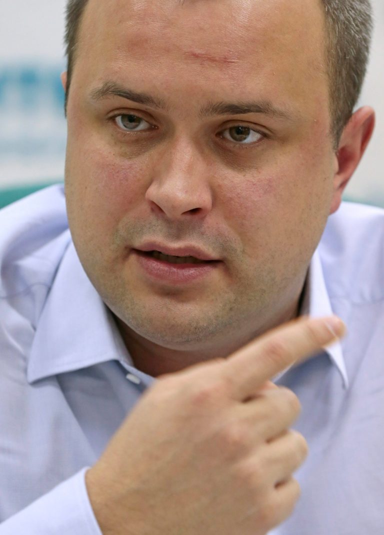   Ilya, son of slain investigative journalist Anna Politkovskaya speaks during a news conference in Moscow, Russia, Tuesday, Dec. 11, 2012. The relatives of a slain Russian journalist are contesting a deal that was made between one of the accused in the case and the authorities investigating the case. While six individuals were originally charged for organizing and carrying out the 2006 murder of Anna Politkovskaya, a sharp critic of the Kremlin's policies in Chechnya, none of them are now sitting behind bars for the crime. (AP Photo/Mikhail Metzel)  