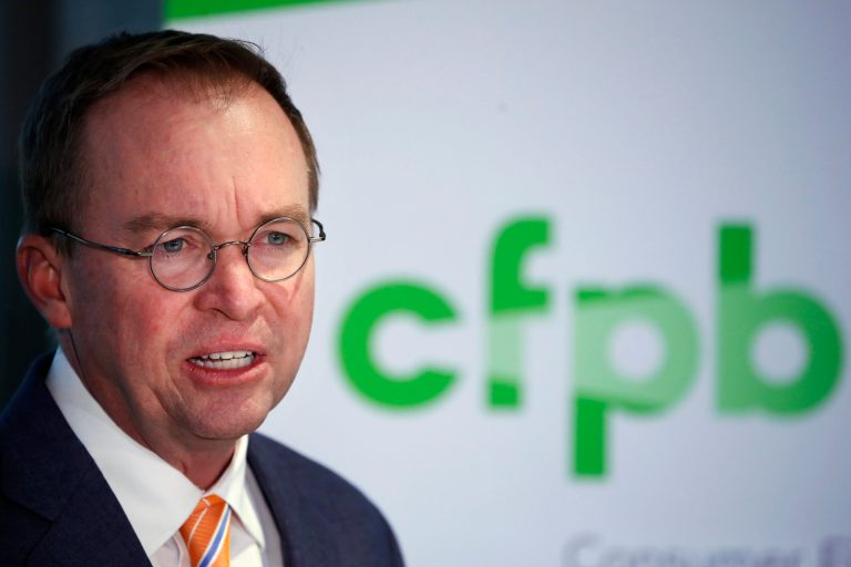 Mick Mulvaney speaks during a news conference after his first day as acting director of the Consumer Financial Protection Bureau in Washington. (AP Photo/Jacquelyn Martin)