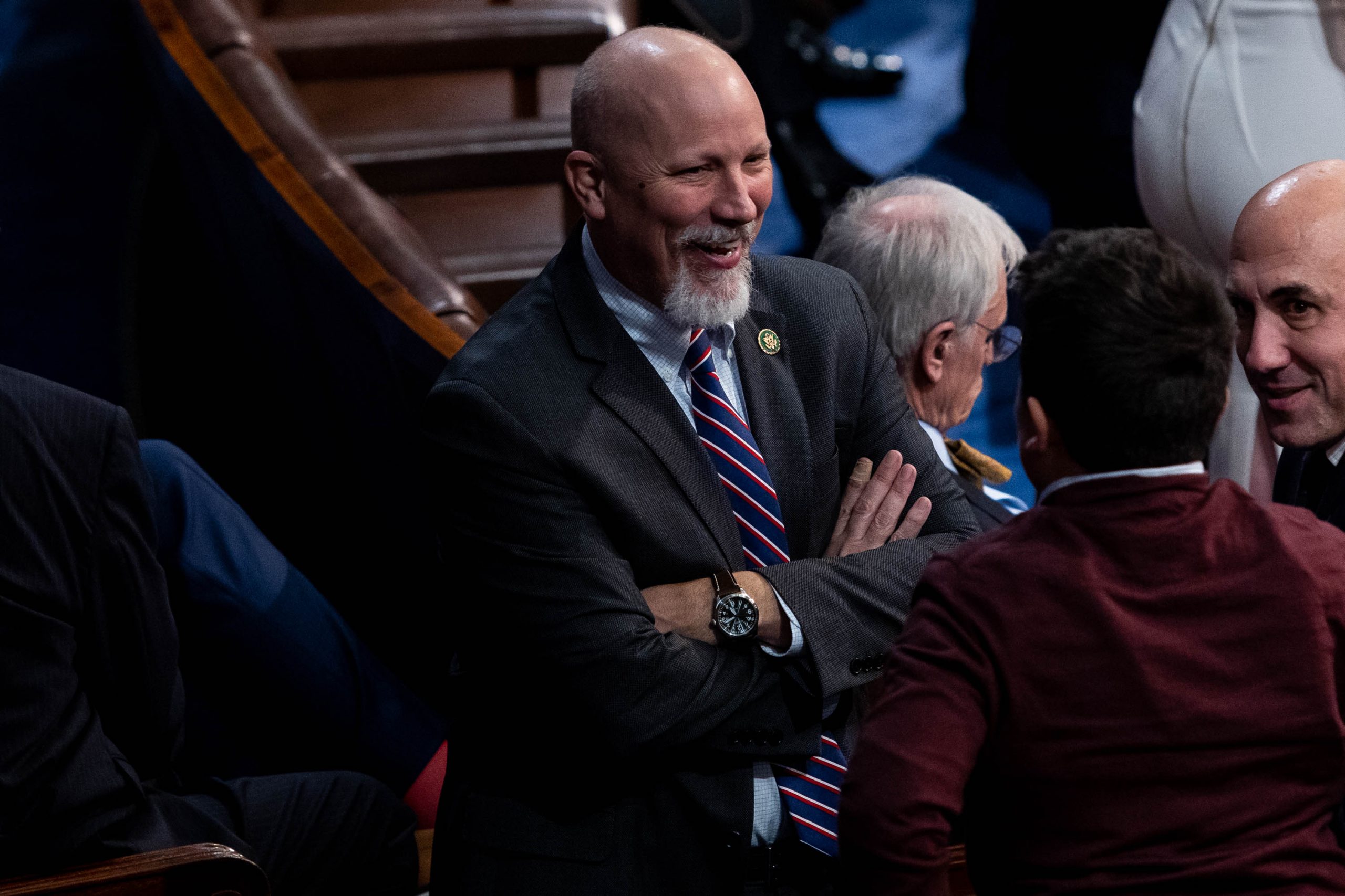 Rep.-elect Chip Roy of Texas talks with colleagues on the House floor, following another round of voting for a new House speaker on the first day of the 118th Congress, Tuesday, January 3, 2023.