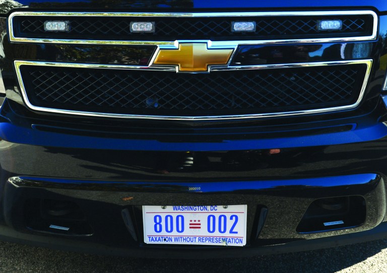 A presidential vehicle, parked outside the White House in Washington, Saturday, Jan. 19, 2013, sports Washington's 