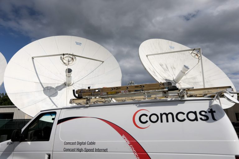 Â A Comcast truck is seen parked at one of their centers on February 13, 2014 in Pompano Beach, Florida. Comcast announced a $45-billion offer for Time Warner Cable. (Photo by Joe Raedle/Getty images)
