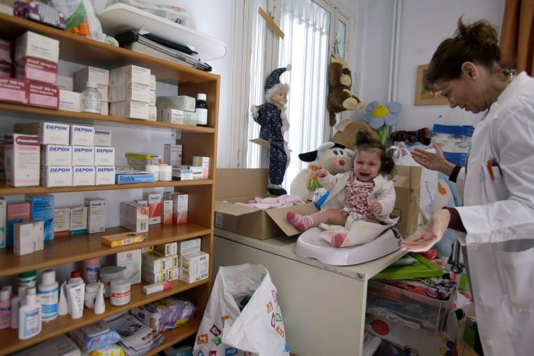 The government and insurers will standardize the way doctors are evaluated and paid. (AP Photo/Thanassis Stavrakis, File)