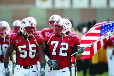 Maryland's Isaiah Ross (56) and Joe Vellano (72) before the start of the Terps' game against Florida International in September. (AP Photo/Rob Carr)