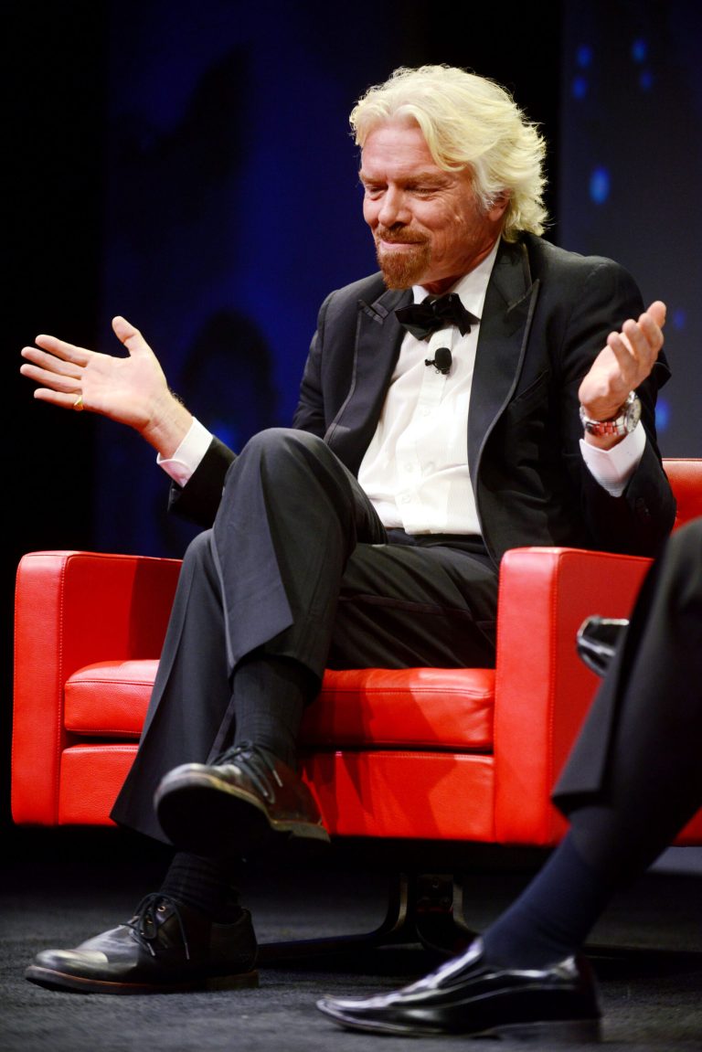 Sir Richard Branson, founder of the Virgin Group, talks about his business and adventures during the Economic Club of Grand Rapids annual dinner at the DeVos Placein Grand Rapids, Mich., on Tuesday, May 27, 2014. (AP Photo/The Grand Rapids Press, Emily Rose Bennett) ALL LOCAL TV OUT; LOCAL TV INTERNET OUT