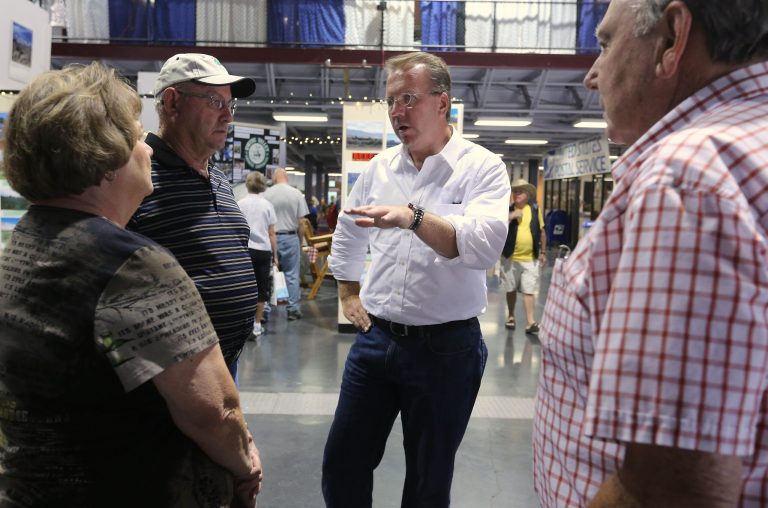 In this photo taken Friday, July 18, 2014, Ron Nehring, the Republican candidate for Lt. Governor talks with visitors to the California State Fair in Sacramento, Calif.  Nehring is trying to unseat in incumbent Lt. Gov. Gavin Newsom, a Democrat, in the November election.(AP Photo/Rich Pedroncelli)