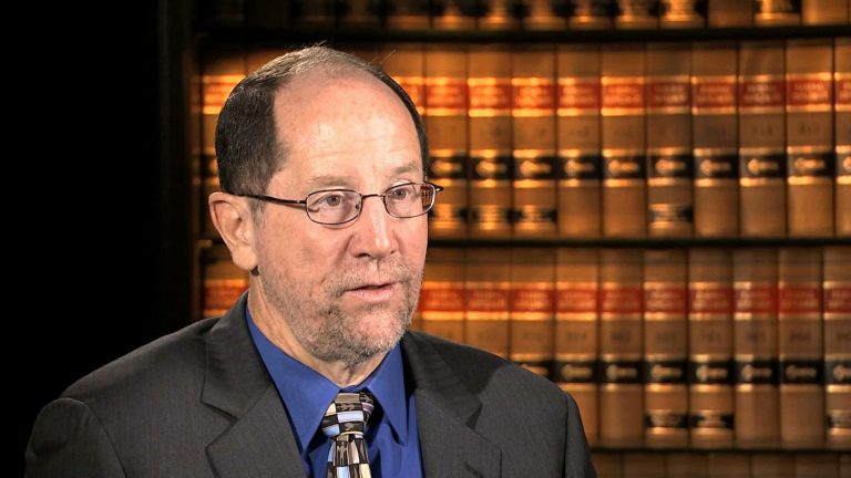 This image from video shows Dr. Dan Lucey of the Georgetown University Medical Center, during an interview with The Associated Press in Washington, Thursday, Sept. 4, 2014, where he discussed the three weeks he spent in Sierra Leone working in a hospital in Freetown and helping other doctors to train local health workers to use personal protective equipment. (AP Photo)