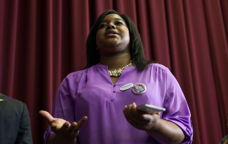 "I was railroaded! I was railroaded by ABC on the two-year anniversary of my father's death!" reporters accompanying Obama to the taping heard Erica Garner shouting. (AP Photo/Evan Vucci)