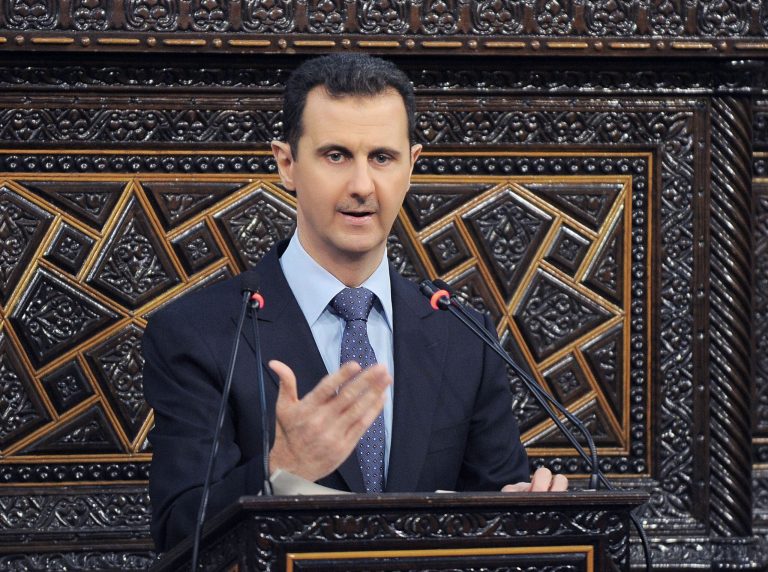 FILE - In this June 3, 2012 file photo released by the Syrian official news agency SANA, Syrian President Bashar Assad delivers a speech at the parliament in Damascus, Syria. Israel launched an airstrike into Syria, apparently targeting a suspected weapons site, U.S. officials said Friday night, May 3, 2013. (AP Photo/SANA, File)