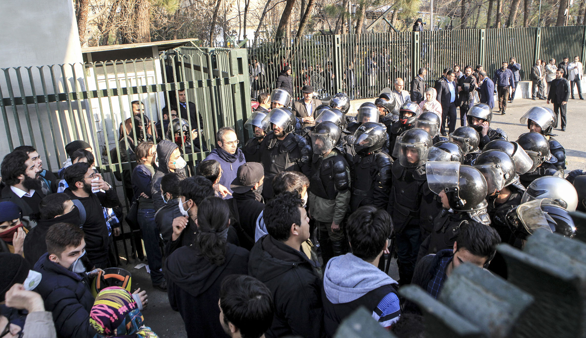 Iran execution: Man publicly hanged from crane amid protests