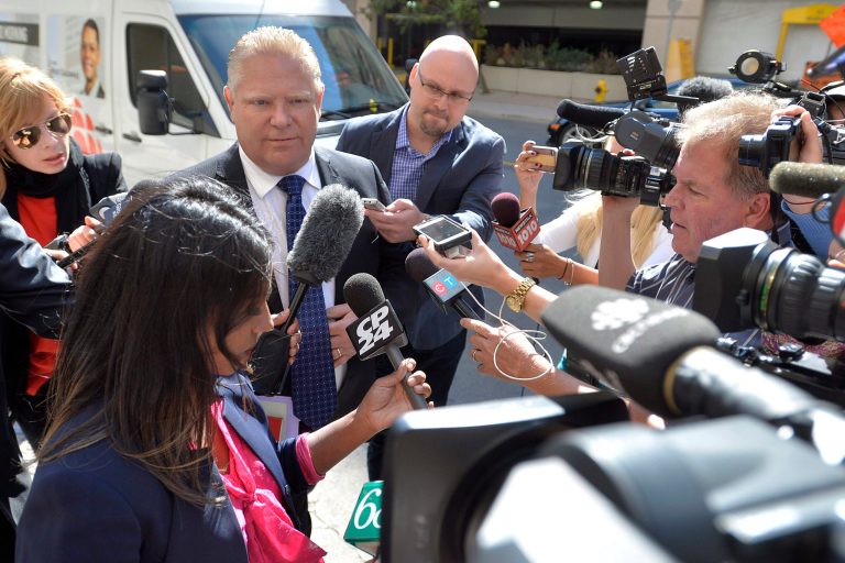 Mayor Rob Ford's brother, Doug Ford, arrives at Mount Sinai Hospital in Toronto on Wednesday, Sept. 17, 2014. Later in the day, Mayor Ford's doctor said he is suffering from a rare and difficult cancer that will require aggressive chemotherapy. (AP Photo/The Canadian Press, Nathan Denette)