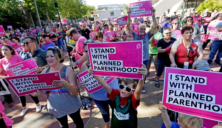 The $20 million, which is an initial investment, will fund grassroots programs as well as ad and mail programs to inform the public about where different candidates stand on issues such as abortion and birth control. (AP Photo/Elaine Thompson)